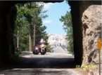 Look closely at the view through the tunnel.  Just another beautiful trip through the hills.  My name is Doug and living in South Dakota makes the rally pretty much a sure thing."